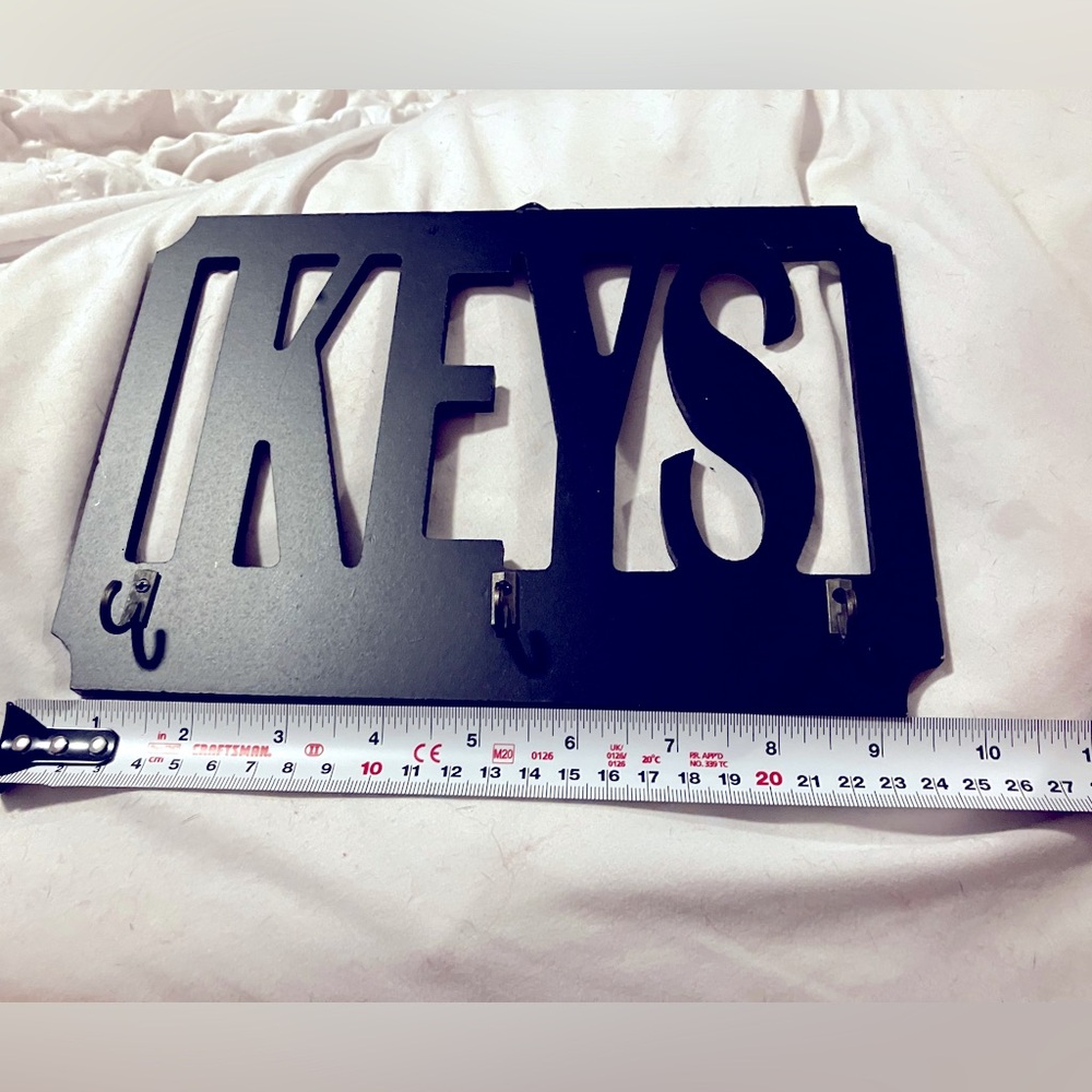 Black cutout key holder